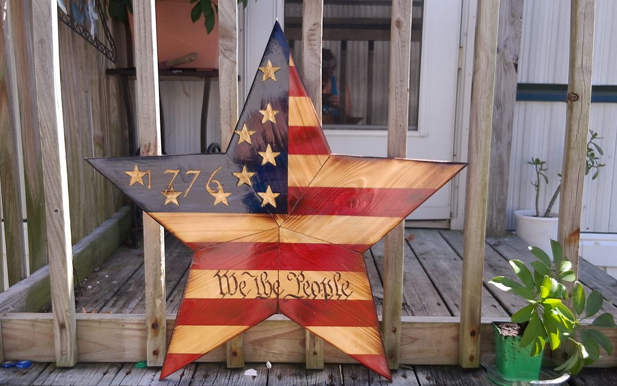 Large wooden barn-style star finished as a 1776 flag